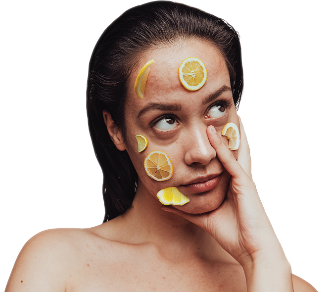 Girl with lemon slices on face